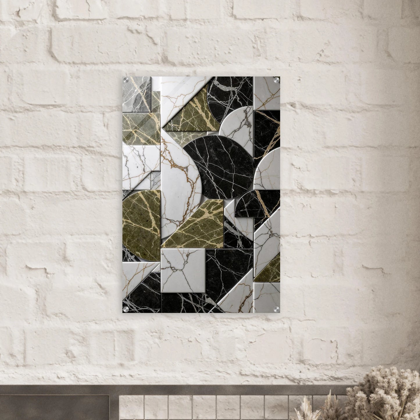 Abstract mosaic art piece on a white brick wall