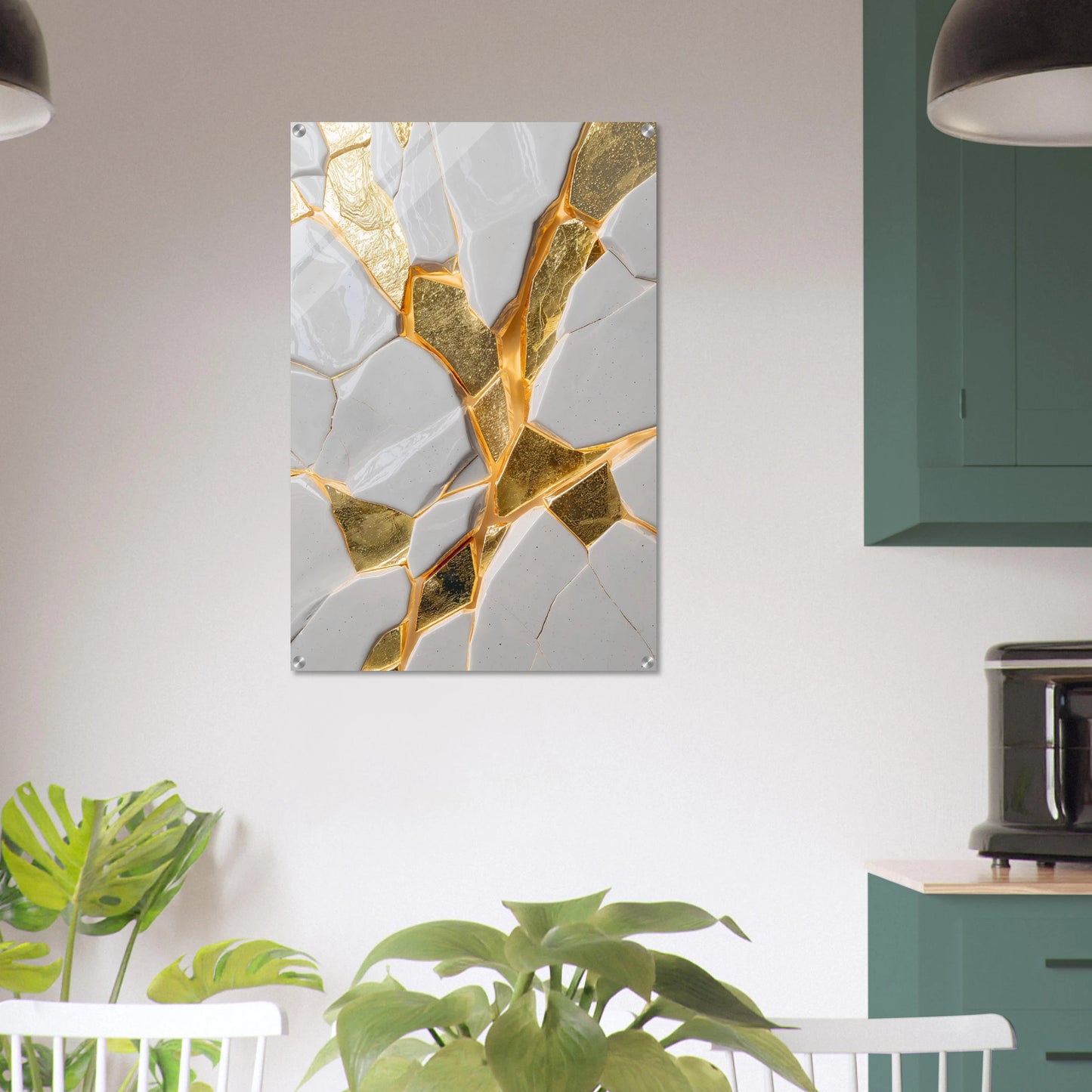 Abstract art piece with gold and gray design on a wall in a room with plants and furniture.