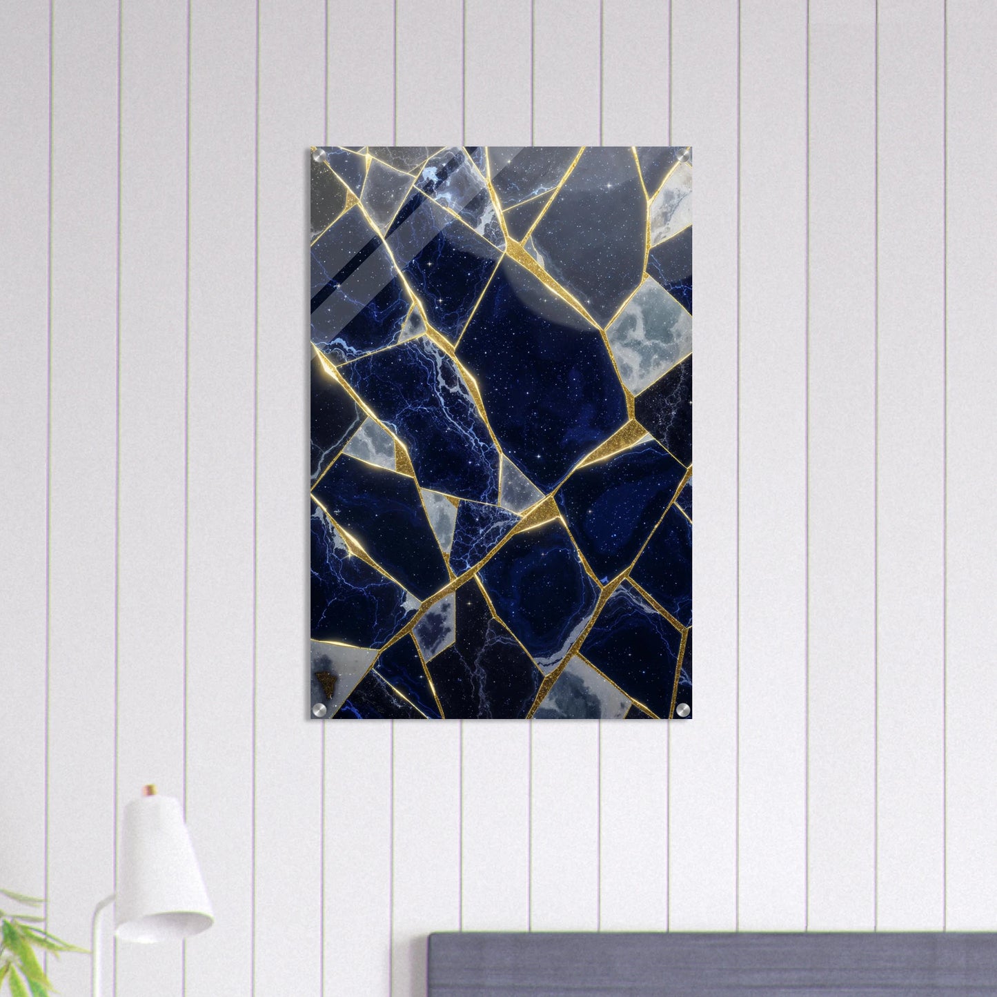 Marble-patterned wall art on a white paneled wall