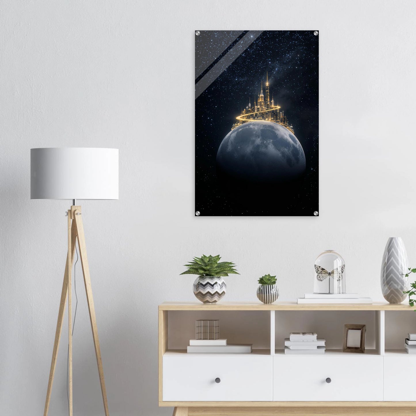 Decorative art of a castle on a moonlit sky above a modern interior with a lamp and shelves.