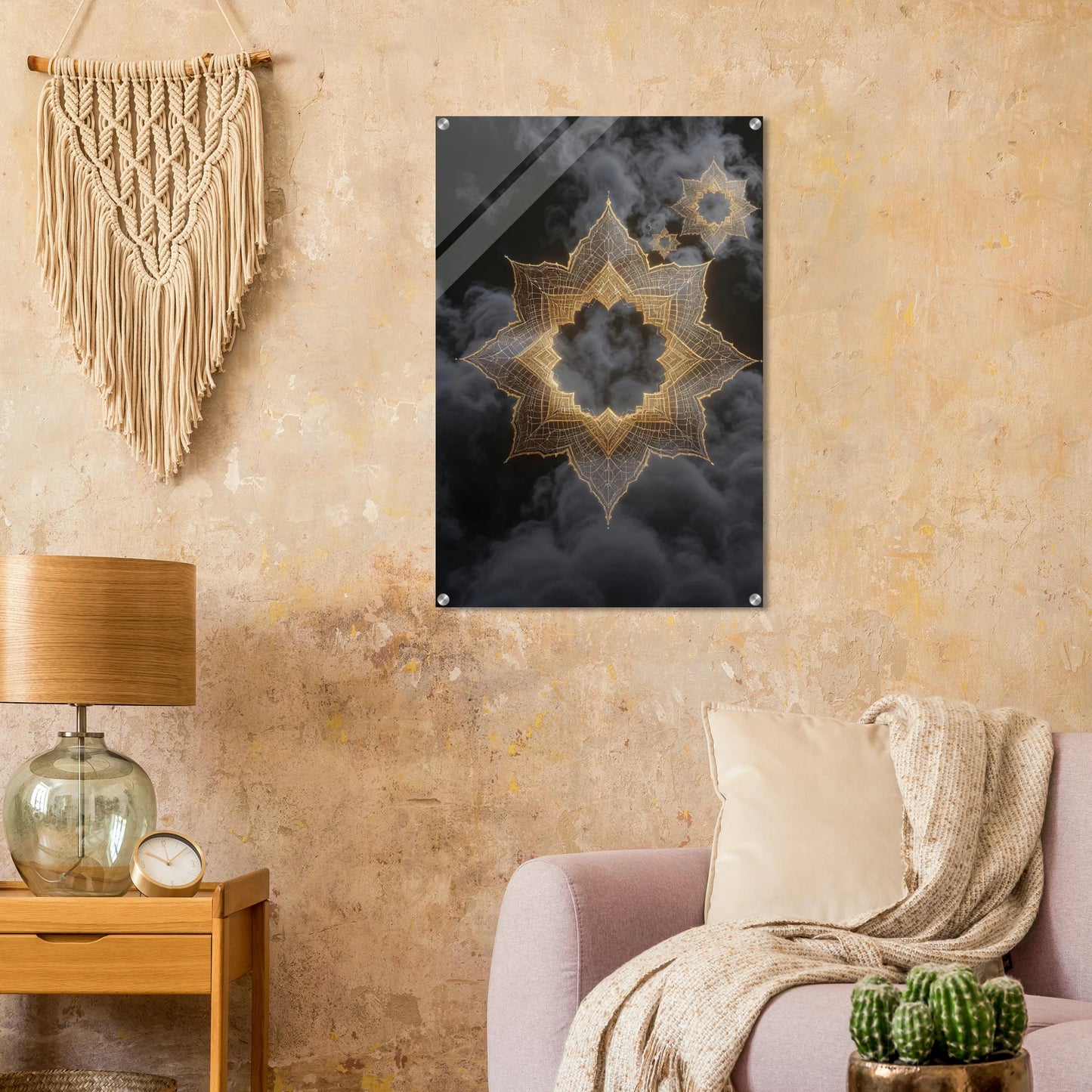 Decorative wall art piece on a textured wall with a lamp and plant in the foreground.