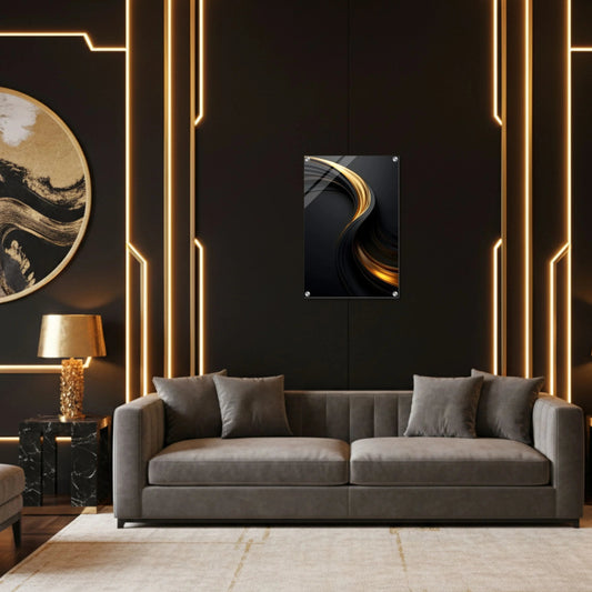 Modern living room with a gray sofa, decorative wall art, and gold accents.