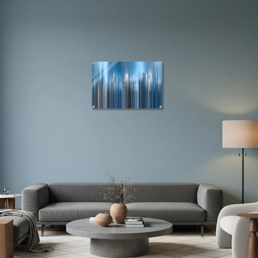 Modern living room with a gray sofa, round coffee table, and abstract wall art.