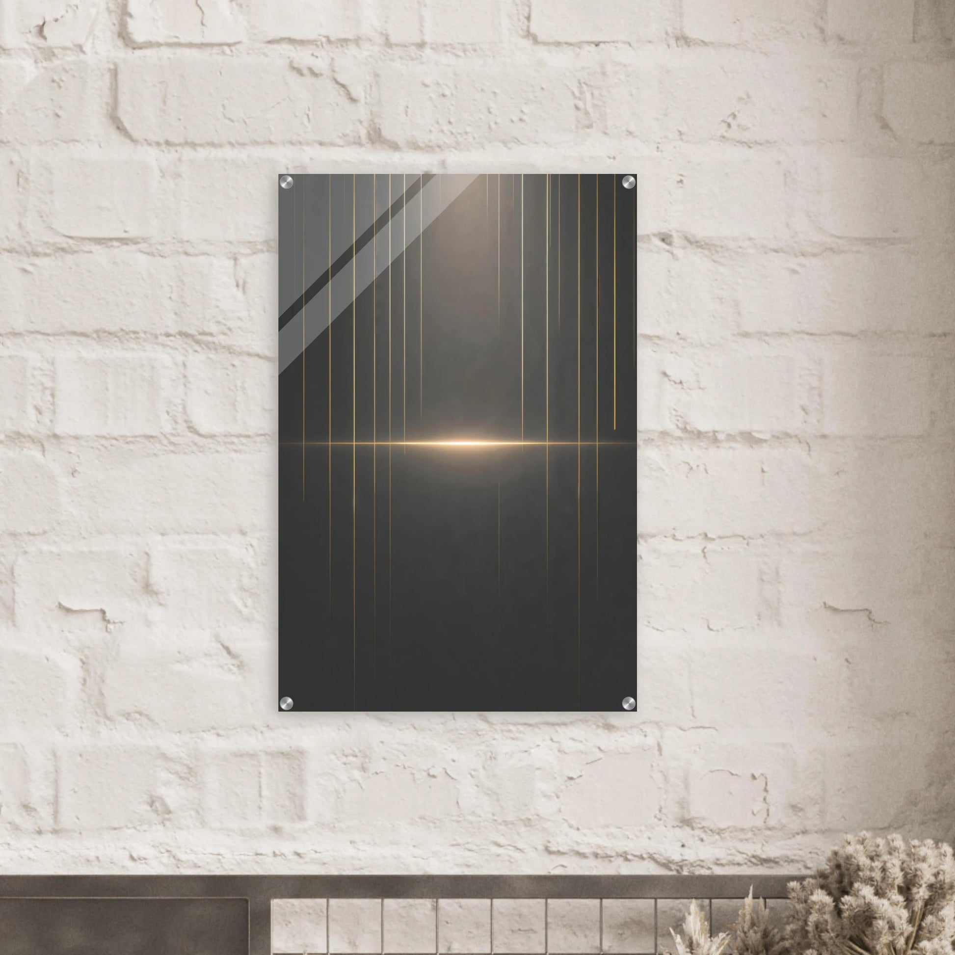 Modern wall art piece with geometric design on a white brick wall
