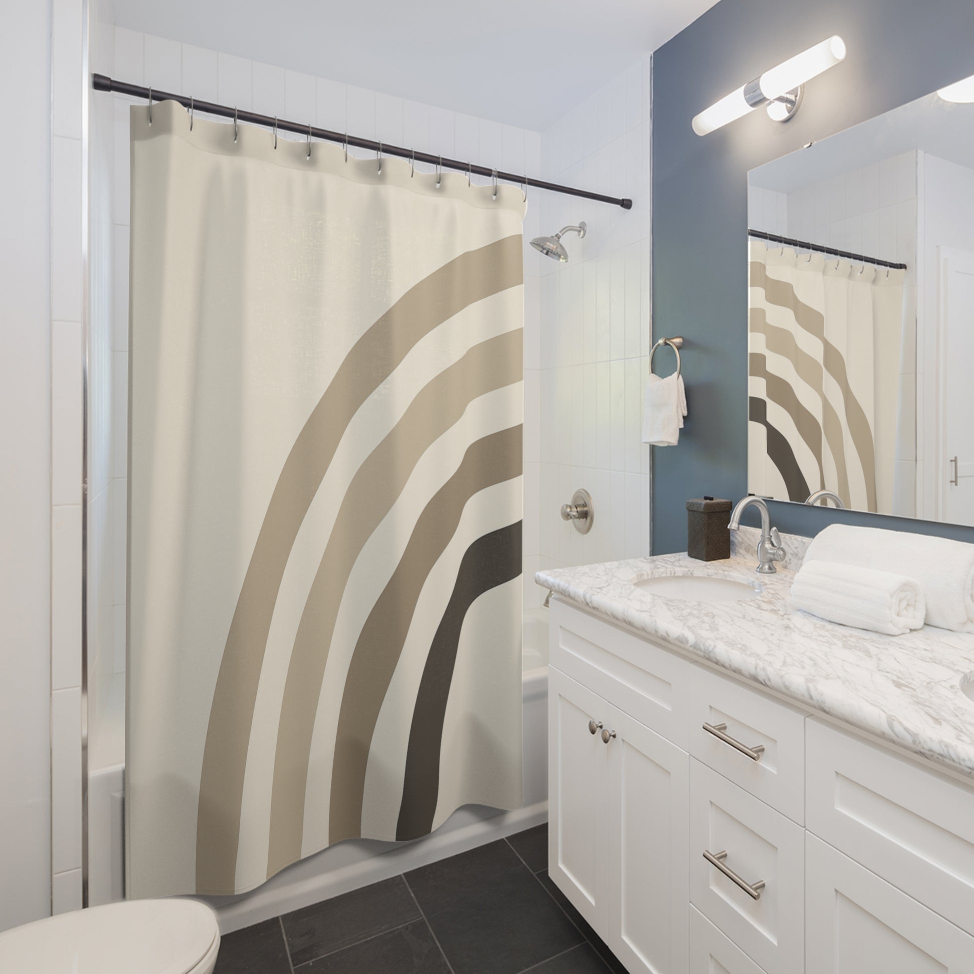 Bathroom with a shower curtain featuring wavy patterns, white vanity, and mirror.