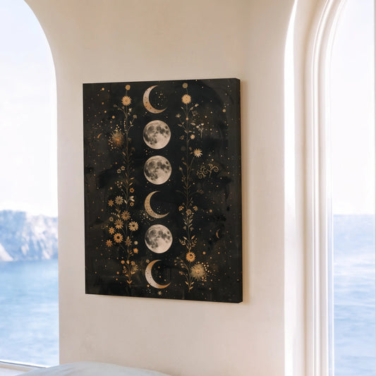 Decorative wall art with moon phases in a room with large windows showing a scenic view.