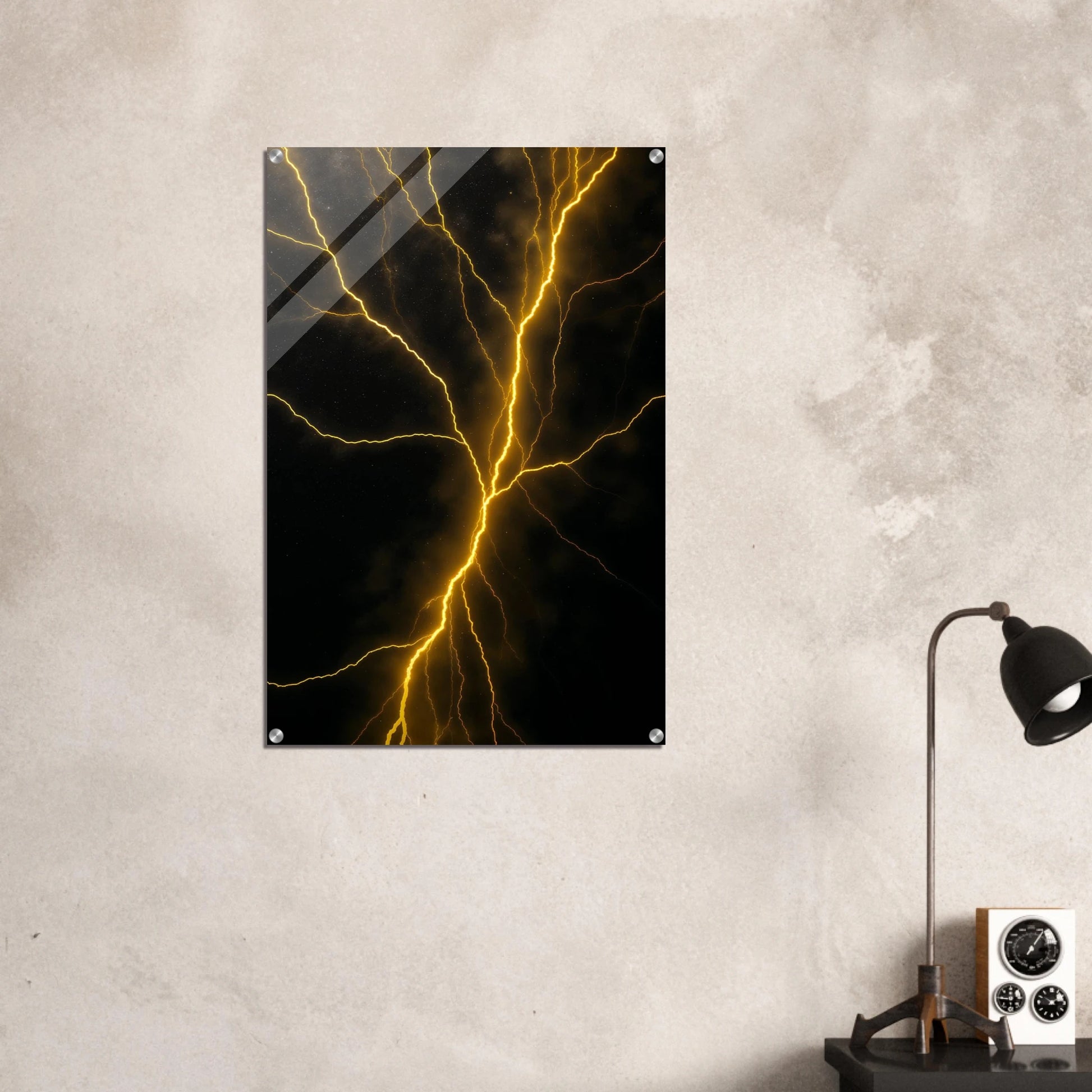 Abstract art print of yellow lightning on a black background, mounted on a textured wall.