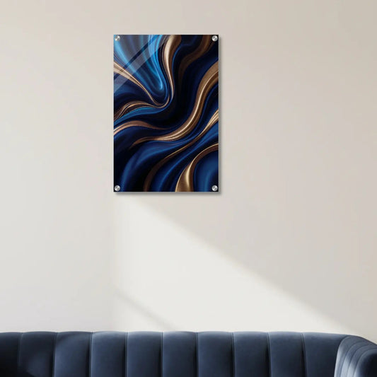 Abstract art piece on a wall above a blue sofa in a living room.