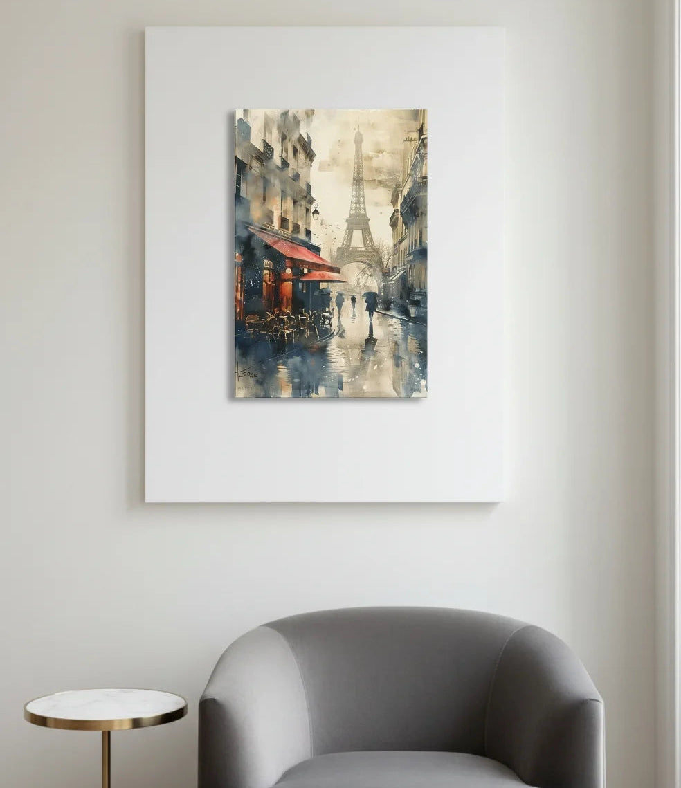 Gray armchair in a room with a painting of a Parisian scene on the wall.
