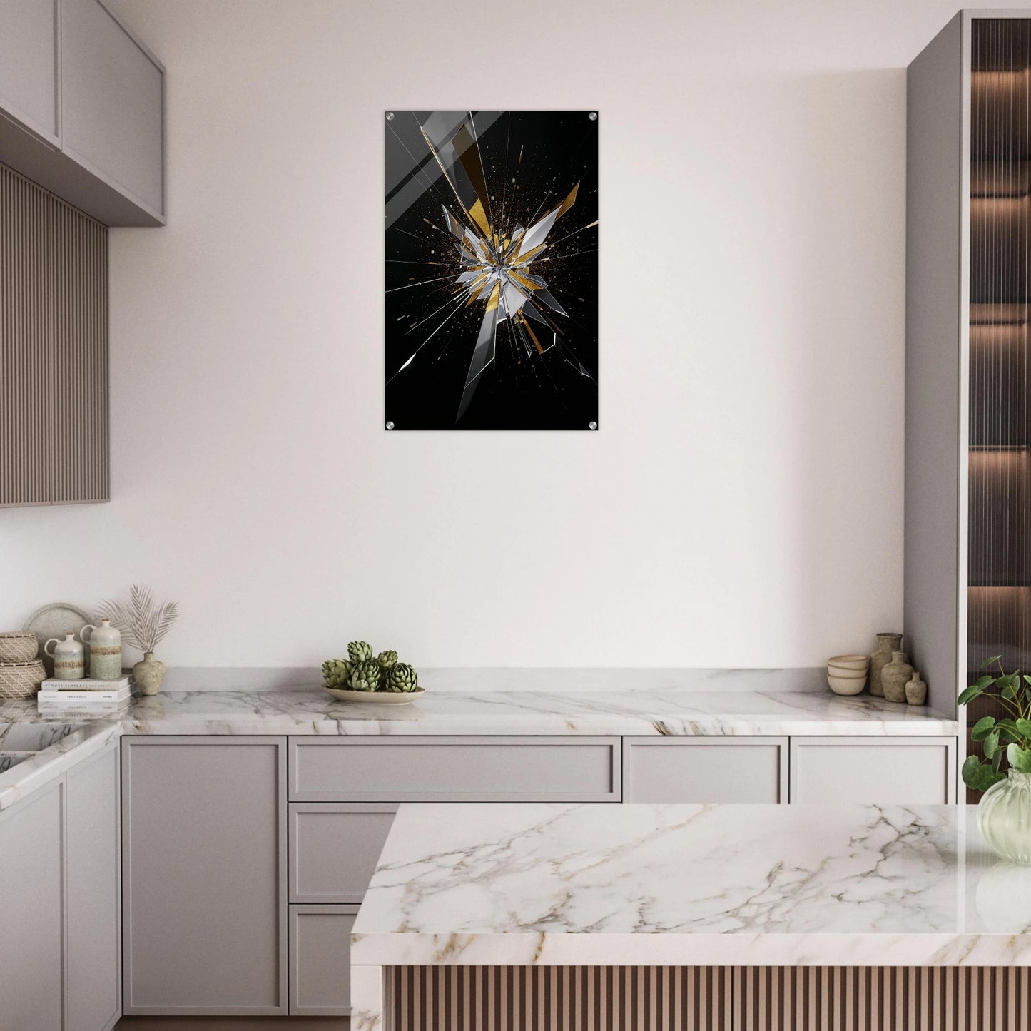 Modern kitchen with marble countertops and a decorative wall art piece.