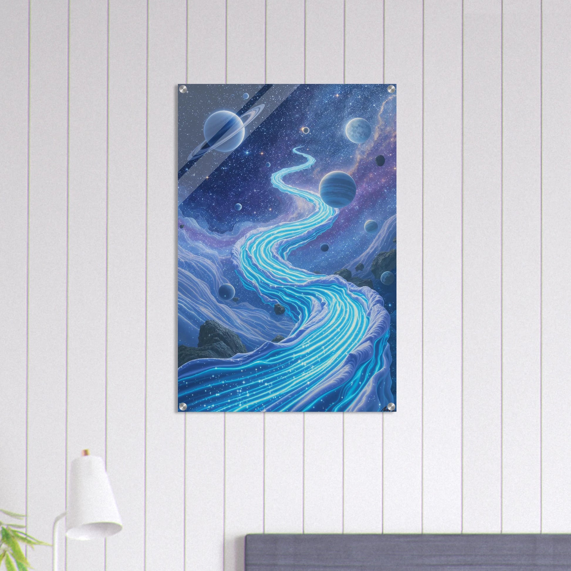 Space-themed wall art with planets and a starry sky on a white wooden panel wall.