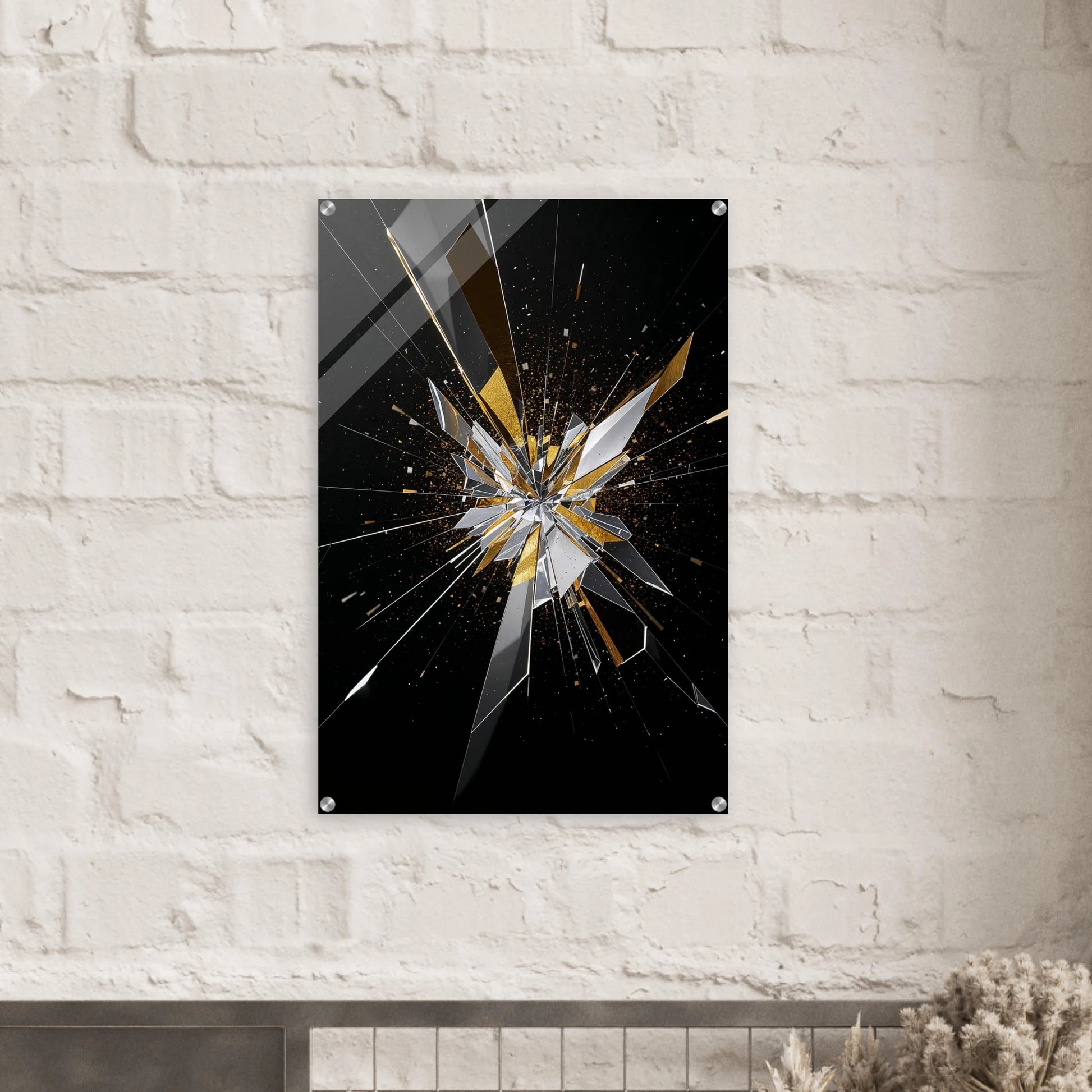Abstract art piece with shattered glass design on a black background, mounted on a white brick wall.