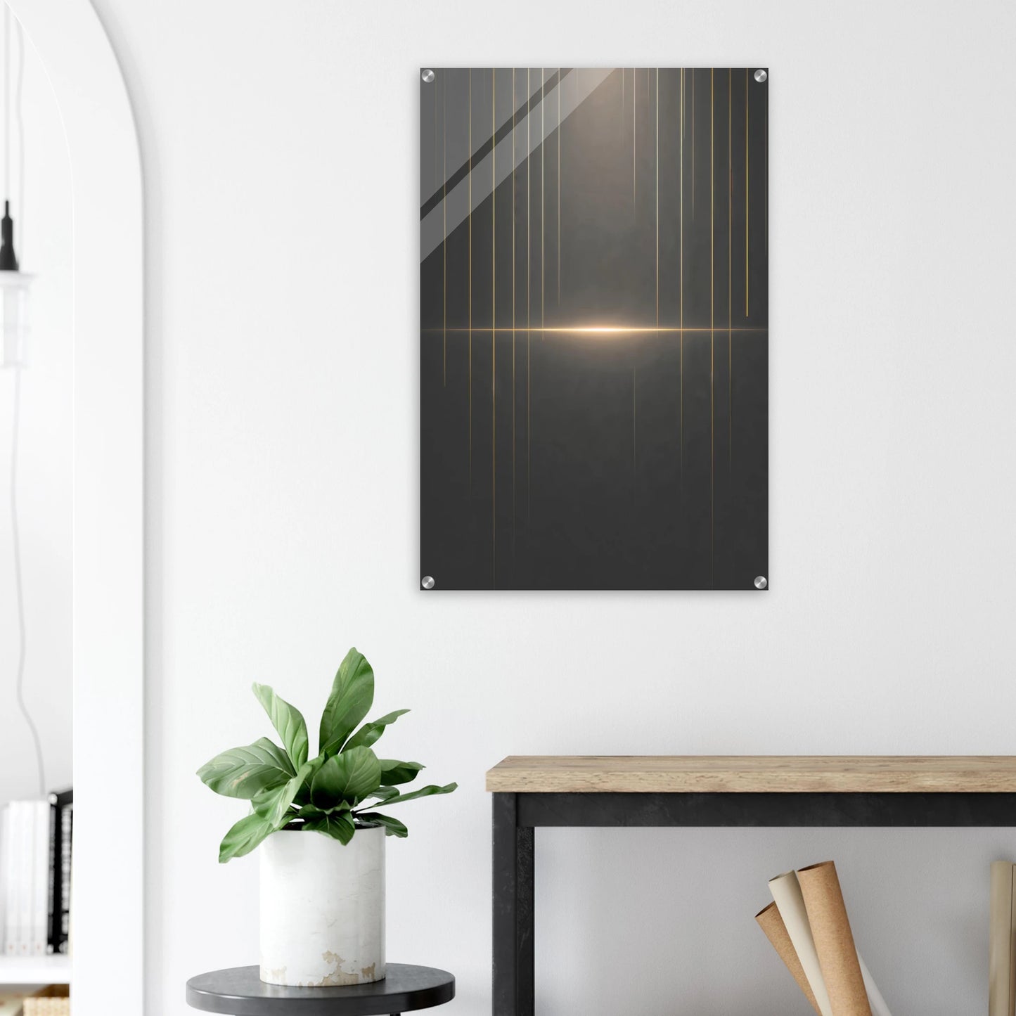Modern wall art piece with geometric design on a white wall above a desk.