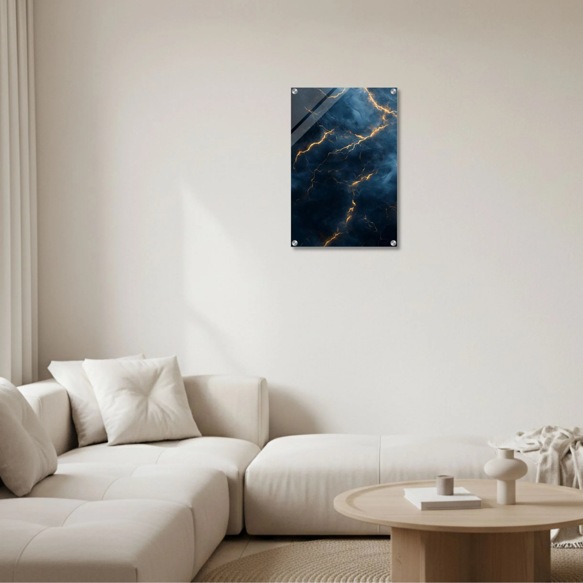 Marble-patterned wall art on a white wall above a beige sofa.