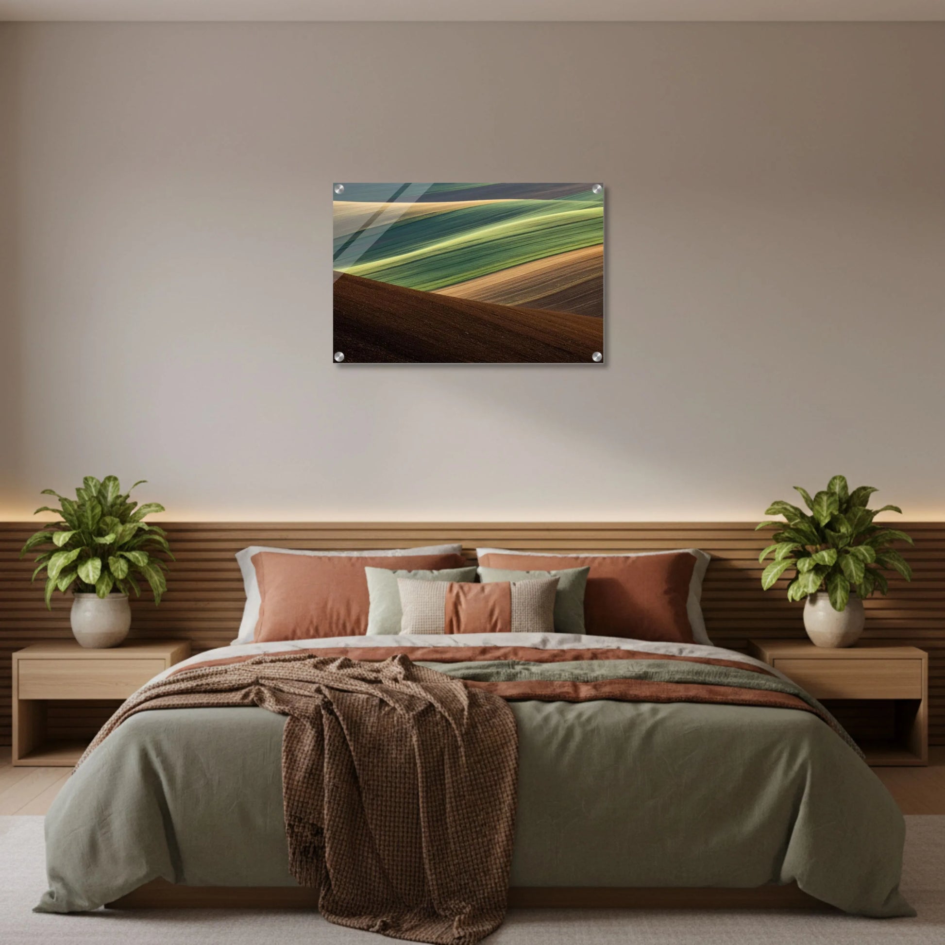 Bedroom with a bed, pillows, and a wall art piece depicting a landscape.