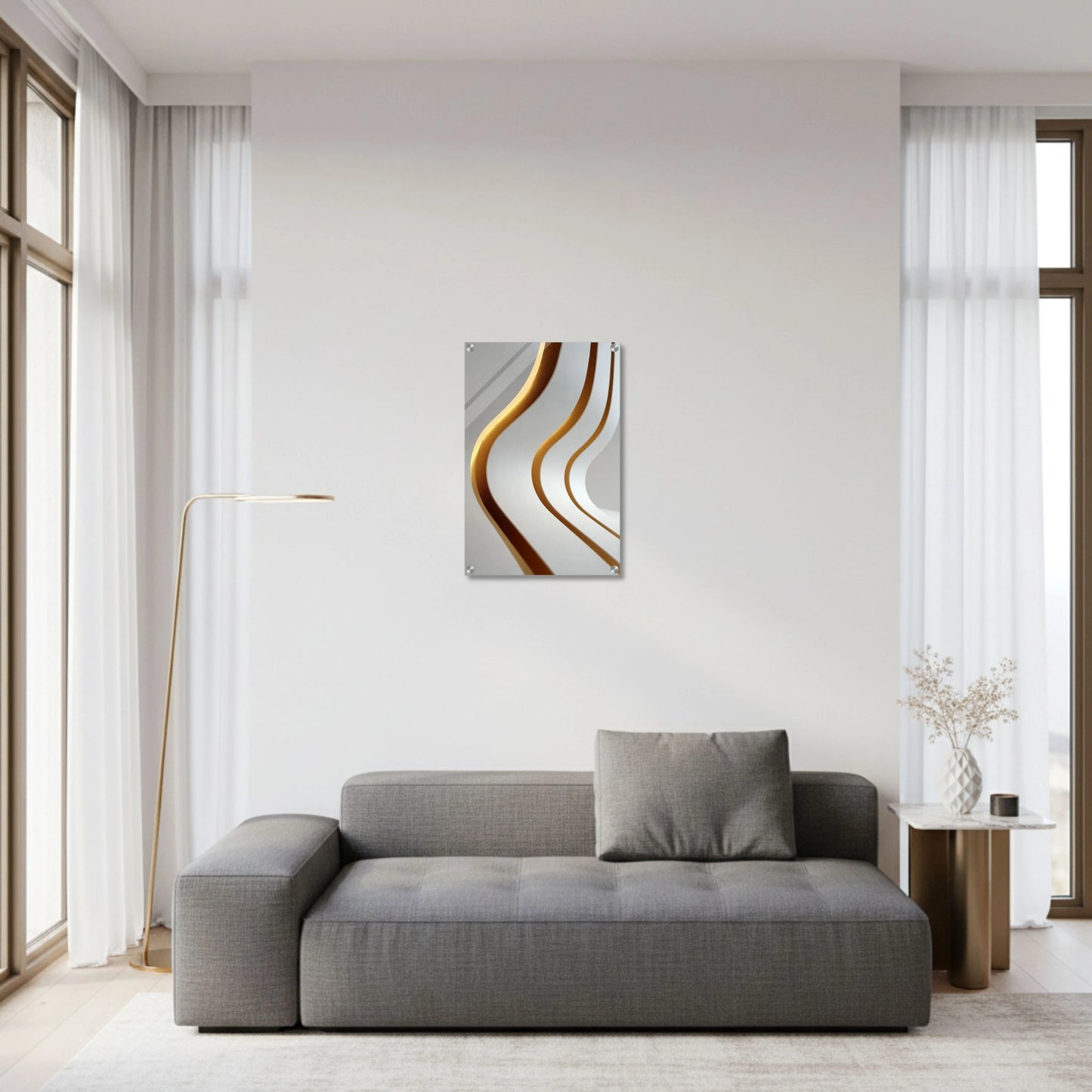 Modern living room with a gray sofa and abstract wall art