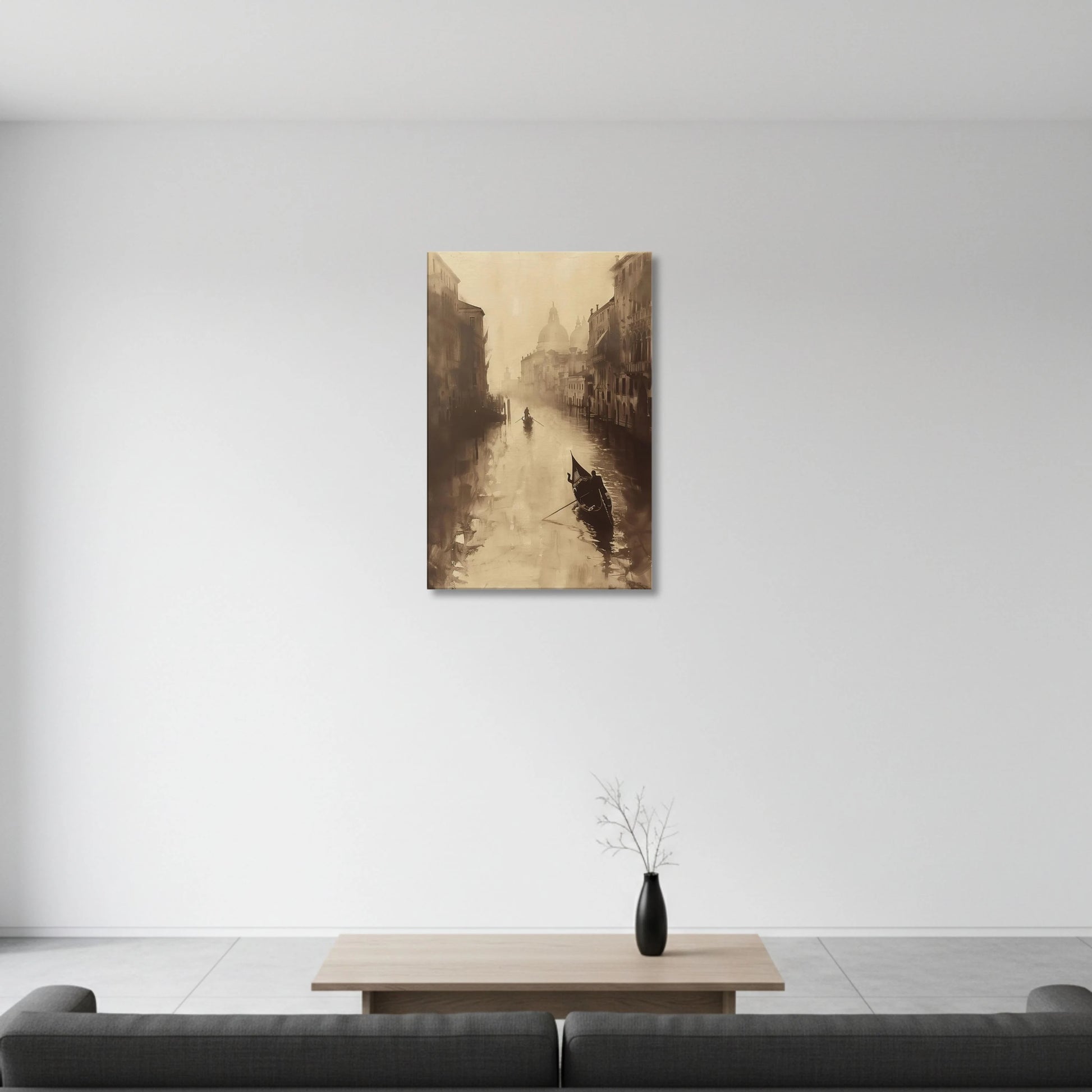 Canvas print of a canal scene with a boat, hanging on a white wall above a sofa.