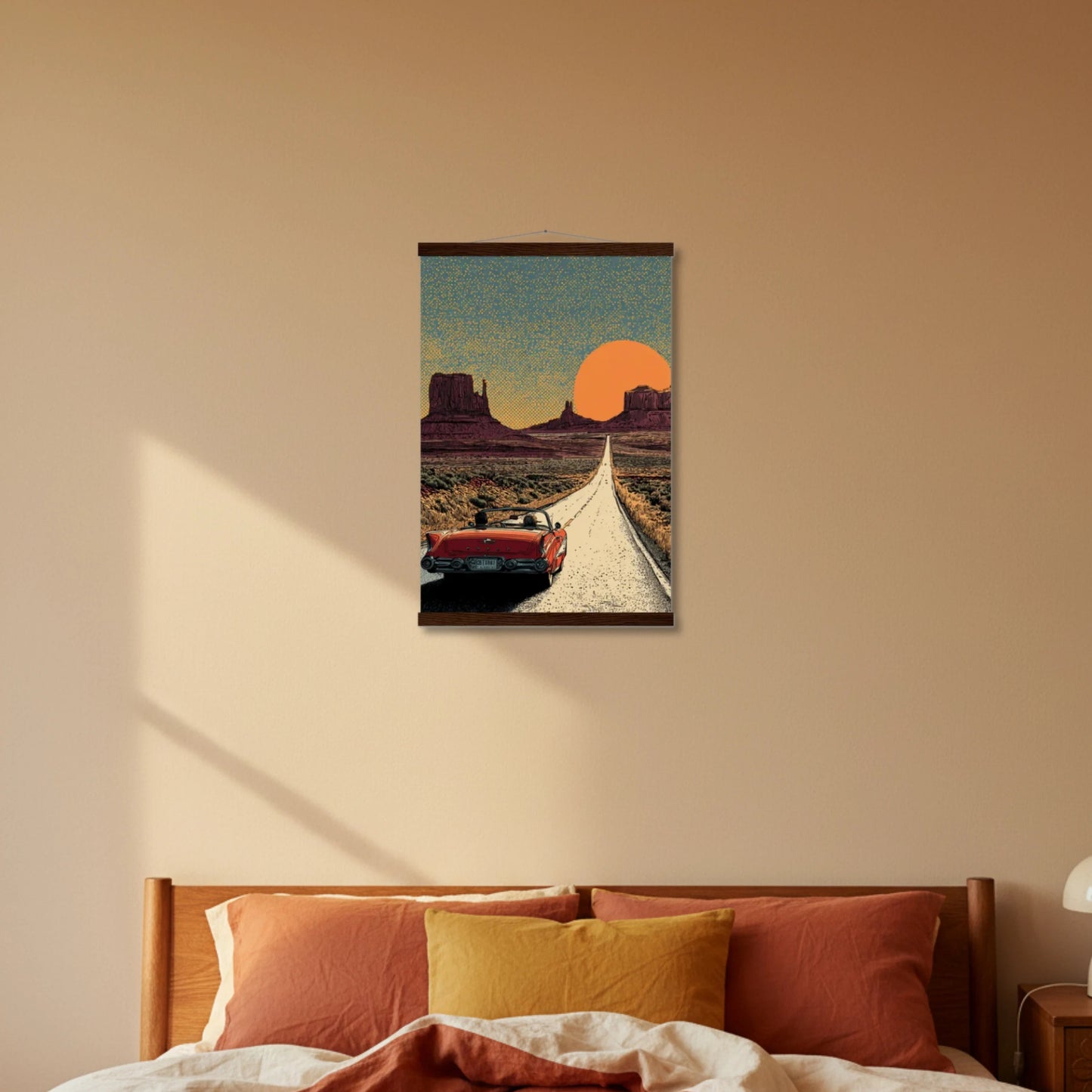 Bedroom with a painting of a desert scene on the wall