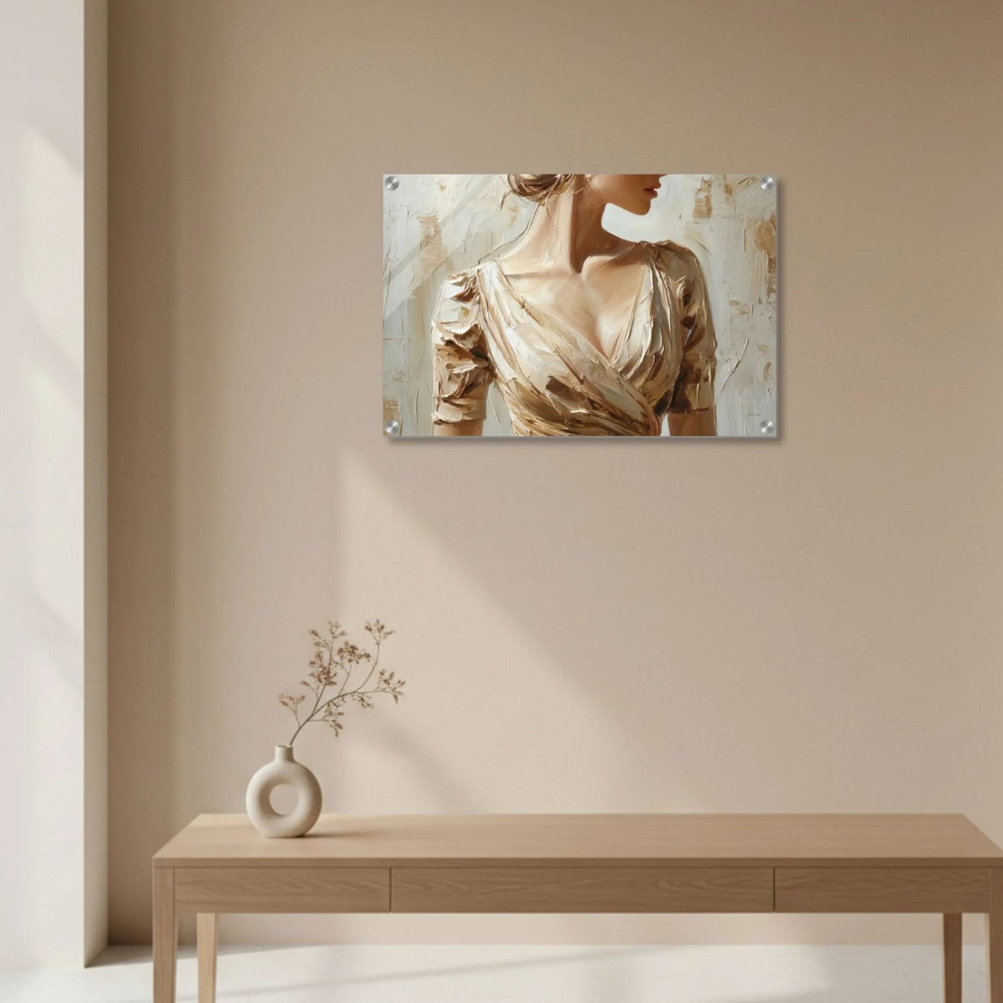Abstract painting on a beige wall above a wooden table with a vase.