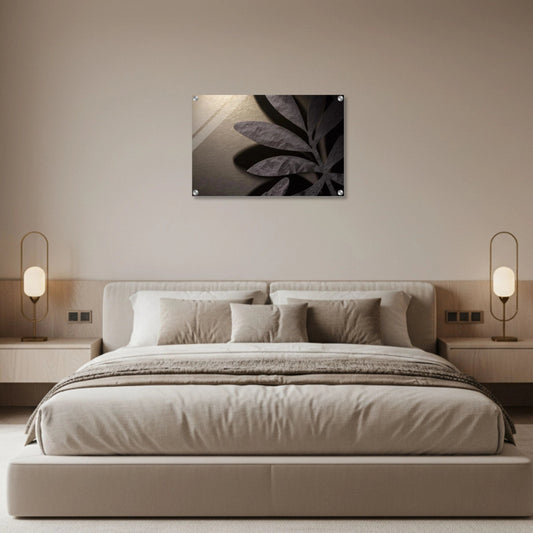 Modern bedroom with a bed, nightstands, and wall art.